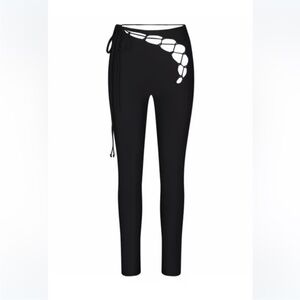 SKIMS Black Leggings with Unique Cutout Design